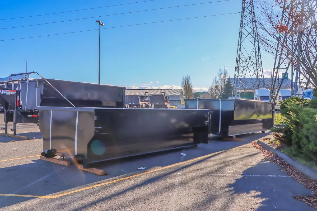 Roll-off dumpster ready for waste disposal at job site for Commercial Dumpster Rental in Cameron
